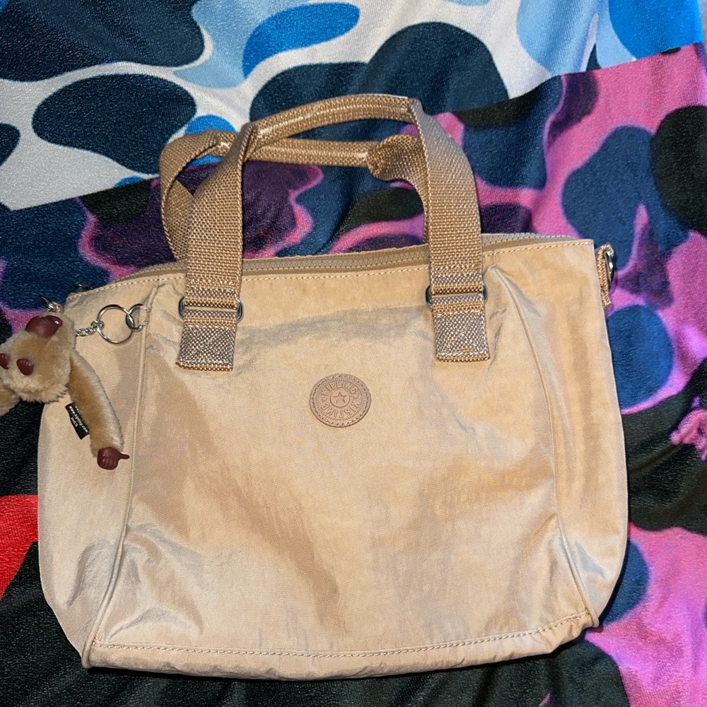 Kipling

Women Brand Logo tan Handbag With Keyring